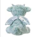 Petit jouet en peluche dragon volant bleu