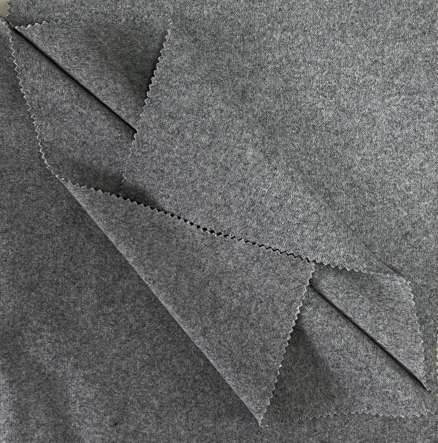 Knitted double face wool polyester blend fabric