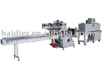 AUTOMATIC SHRINK PACKAGING MACHINE