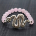 Bracelet de pierres précieuses tendues de perles rondes à quartz rose 8MM avec pièce de serpent Diamante