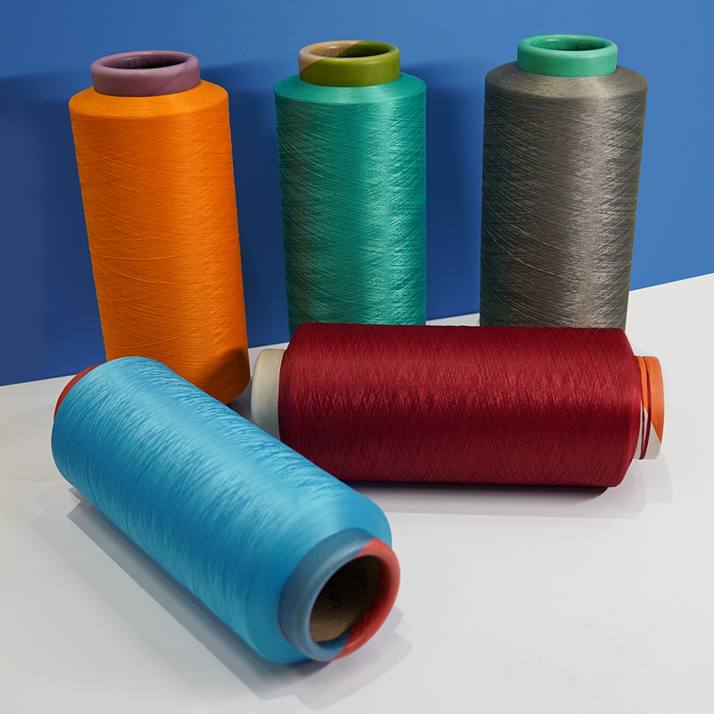 Polyester dope dyed filament yarn for sewing tread