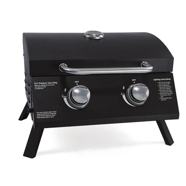 Detailed view of gas grill burner system and construction quality