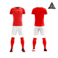 Conjunto de traje de fútbol rojo para entrenamiento deportivo de adultos.
