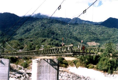 Permanent Stability Large Span Steel Suspension Bridges With Rock Anchors