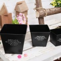Square black flower arrangement bucket