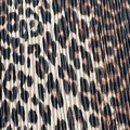 Tessuto pieghettato con stampa leopardata