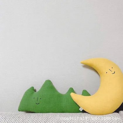 Adorable Moon and Nature-Inspired Baby Nursery Decor: Comfort Cushions, Cloud-Shaped Pillows, and Forest-themed Plushes