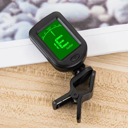 Accurate Un-rechargeable Guitar Tuner for Stringed Instruments