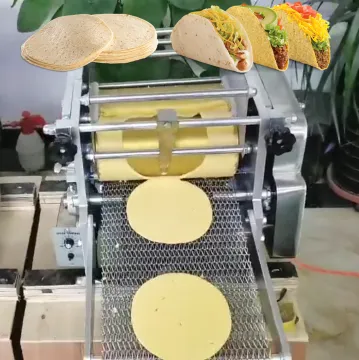 Maquina Industrial Manual para Empaque y Aplastado de Tortilla y Pita" 

This title focuses on the key aspects of the original query such as the machine being manual, its use for packaging and flattening tortillas and pitas, which seems to be the main int