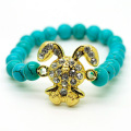 Turquoise 8MM perles rondes Bracelet extensible de pierres précieuses avec pièce de lapin en alliage Diamante