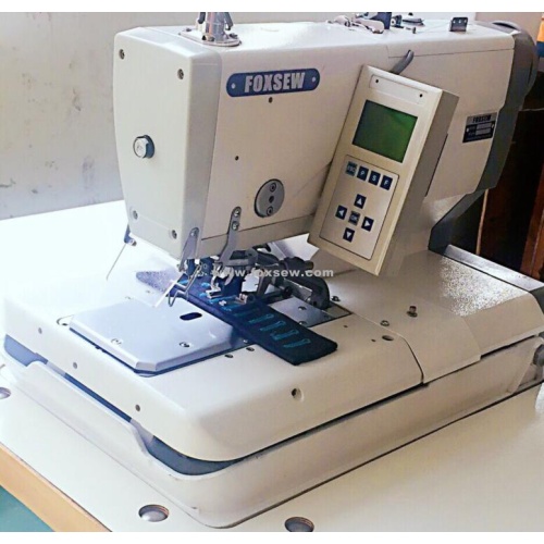 Machine à boutonnière à oeillet électronique