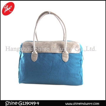 fashion women handbag/canvas shoulder bag/pu duffel bag with rivet on bottom