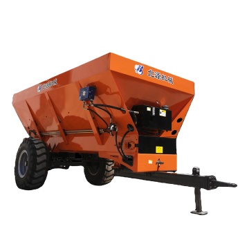 Tractor trailed twin disc manure spreader for organic fertilizer spreading