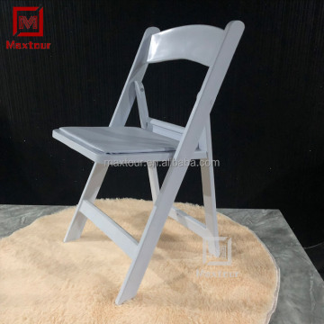 Outdoor Wedding Banquet Rental: White Plastic Resin Folding Chairs