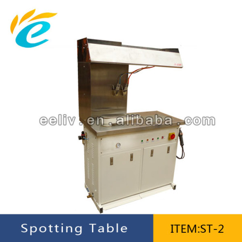 Commercial laundry spotting table