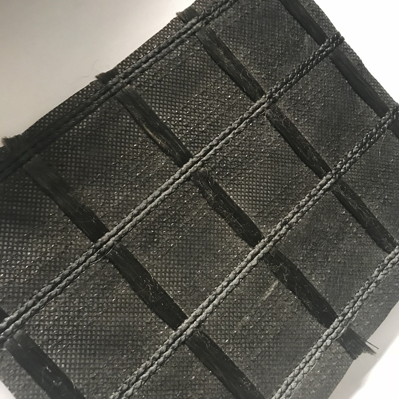 Géogrille en fibre de verre enduite de bitume avec géotextile non tissé