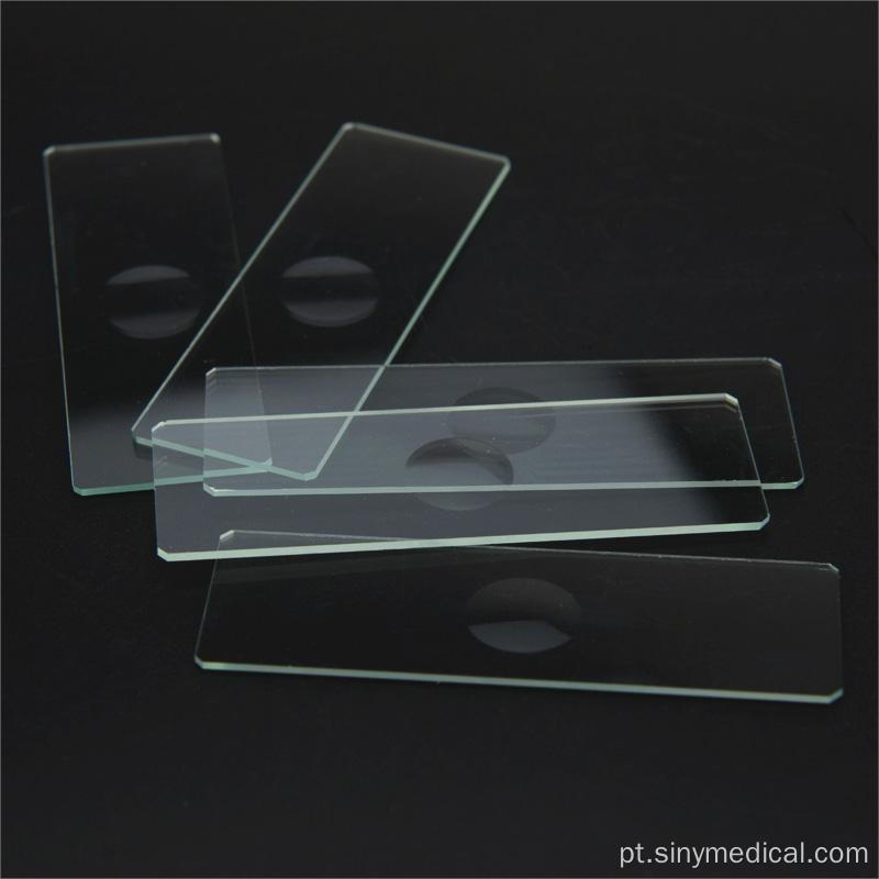 Microscópio lâminas de vidro com bordas no solo