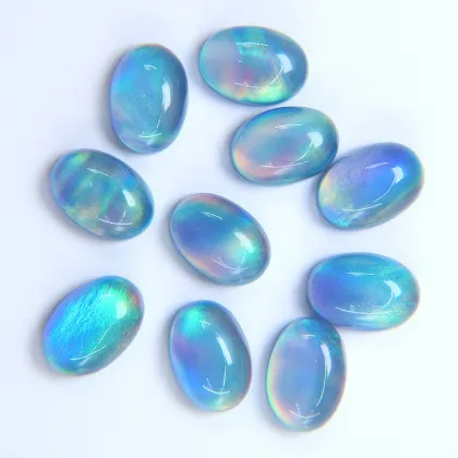 Synthetic Aurora Opal White Crystal Egg Shaped Plain