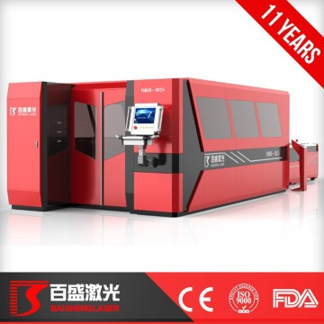 low price exchange worktable fiber laser cutting machine with housing high power fiber laser cutter