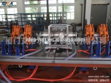 Rotary ultrasonic testing system for high speed tube testing directly in the production line