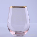 Pink Colored Red Wine Glasses With Gold Rim