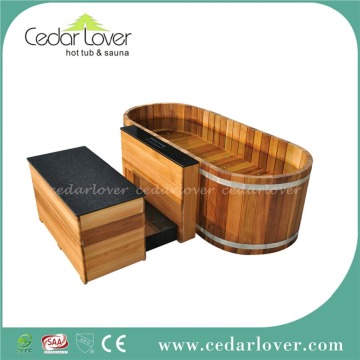 small oval wooden freestanding hydro spa hot tub