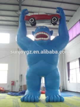 High quality giant advertising inflatable blue gorilla with a car for sale