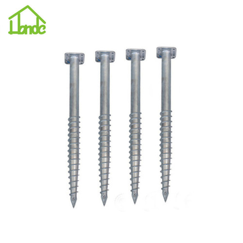 Wooden house using large galvanized ground screw