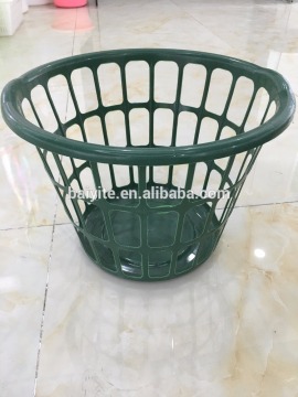 plastic laundry basket with handle in supermarket