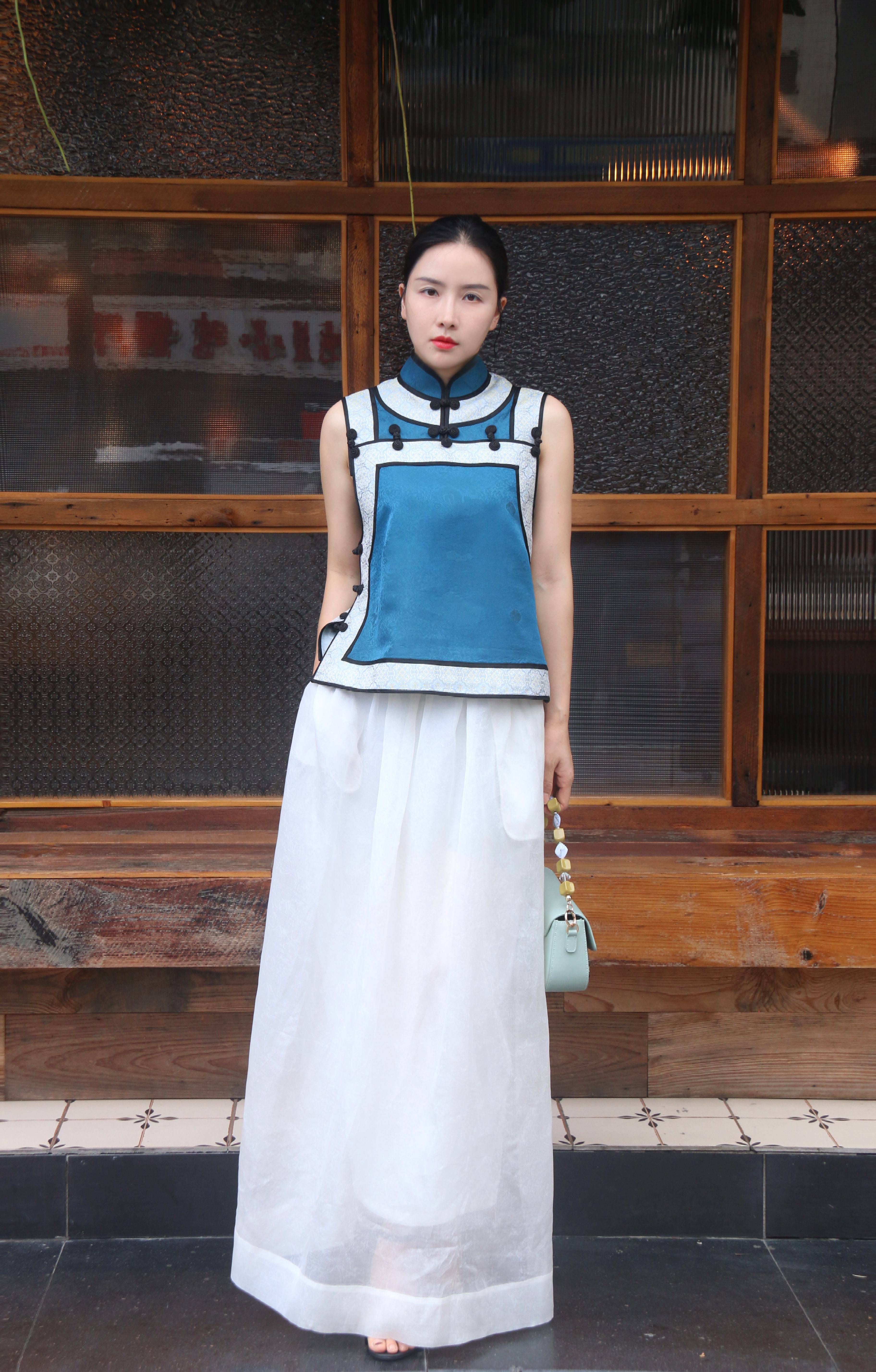 Chaleco sin mangas con botones en espiral Shisanchai Qidu Silan