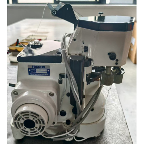 Machine de couture de liaison à entraînement direct