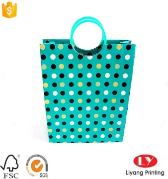Luxury paper gift bag with plastic handle