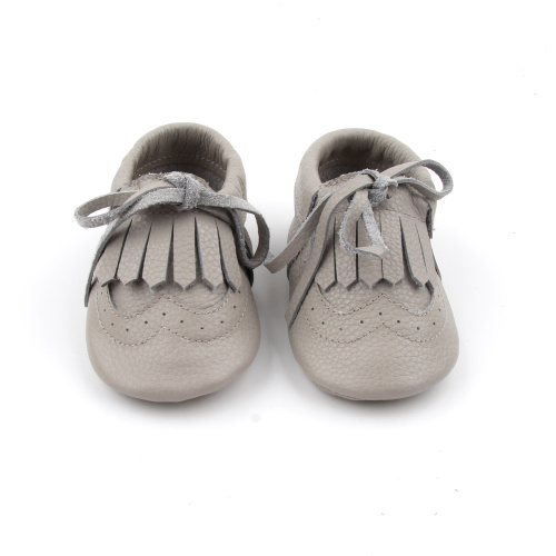 Zapatos de bebé con borlas hermosas de alta calidad de nuevo estilo