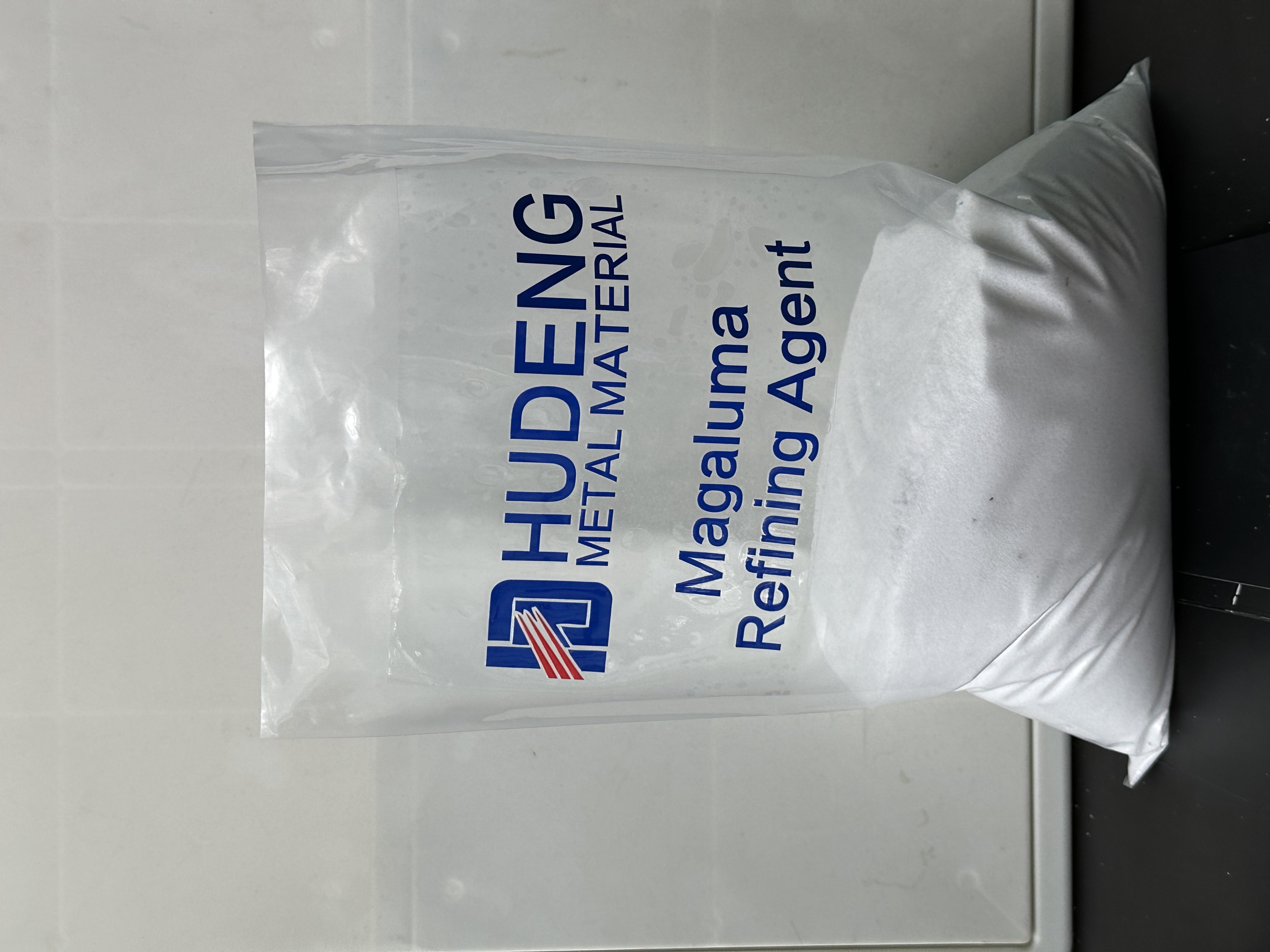 Particle refining agent