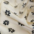Maglia a margherita con stampa lamina nera in poliestere