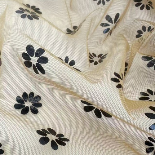 Maglia a margherita con stampa lamina nera in poliestere