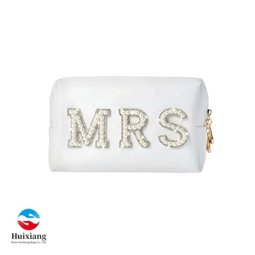 Elegante bolsa de maquillaje octogonal para uso diario.