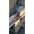 Automatic edge sander for edges in wood