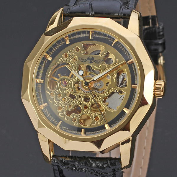 luxury golden wrist watch with ruby skeleton design watch