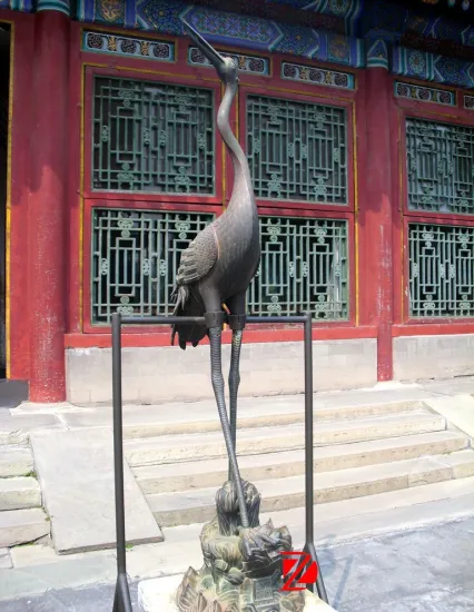 large bronze crowned crane statue