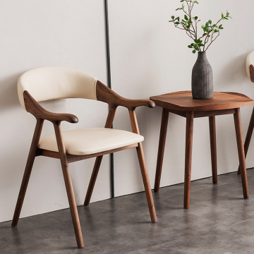 Modern Black Walnut Armchair: A Stylish North American Solid Wood Dining Chair and Guest Seating Option with Soft Bag upholstery