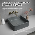 Grey Concrete Wormhole Wash Basin: A Unique Addition to Your Bathroom Sink