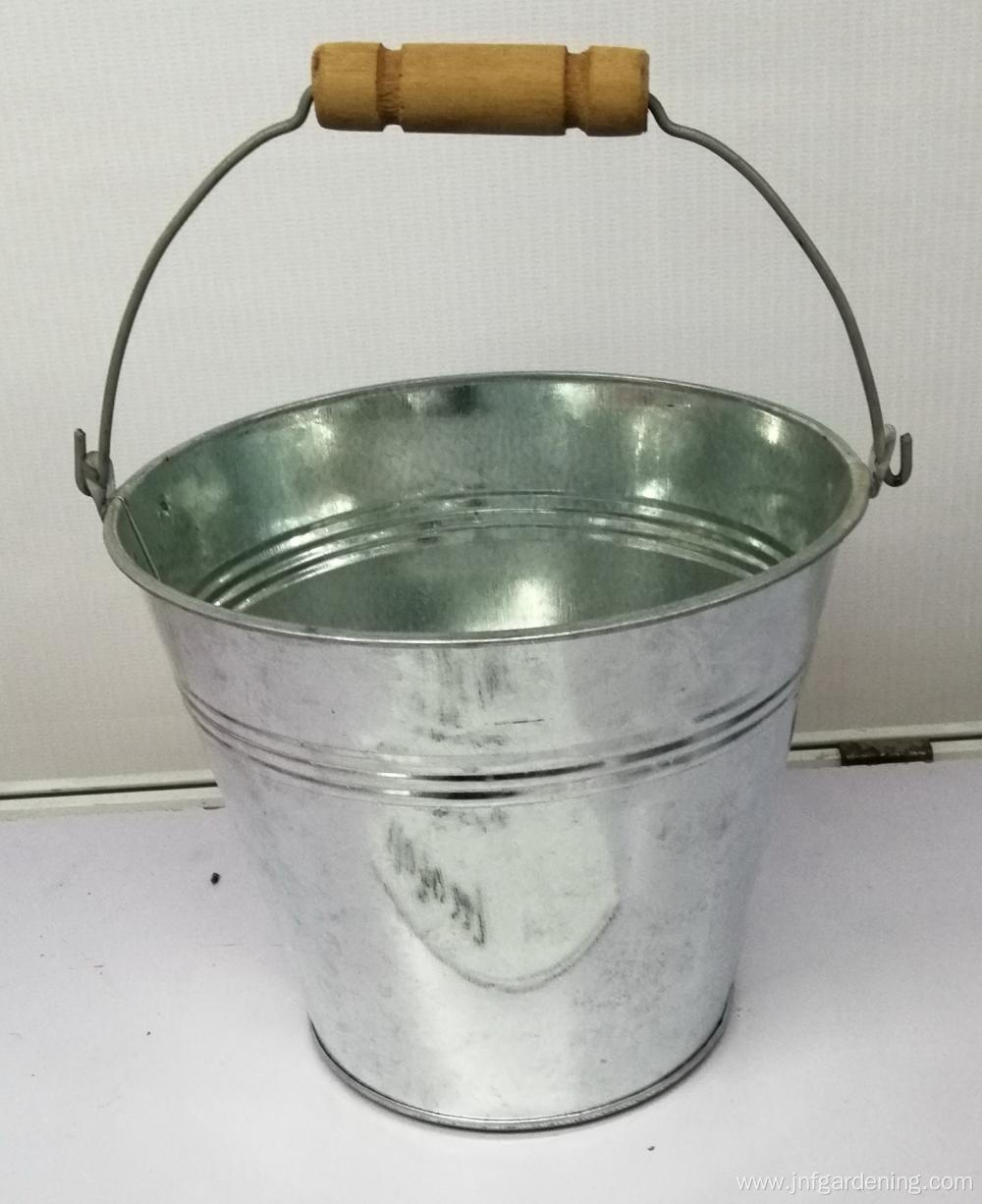 Metal round bucket with metal handle