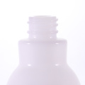 Opal white shaped glass bottle with white pumps