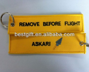 remove before flight embroidered keychain, with remove before flight on one side and your logo on other side