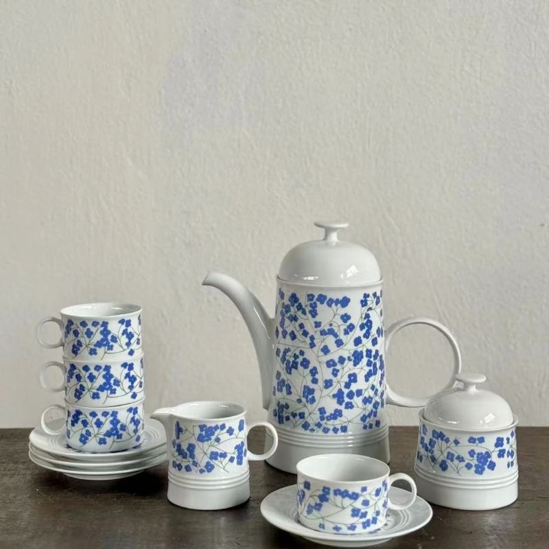 Elegant White Dinnerware with Blue Floral Accents