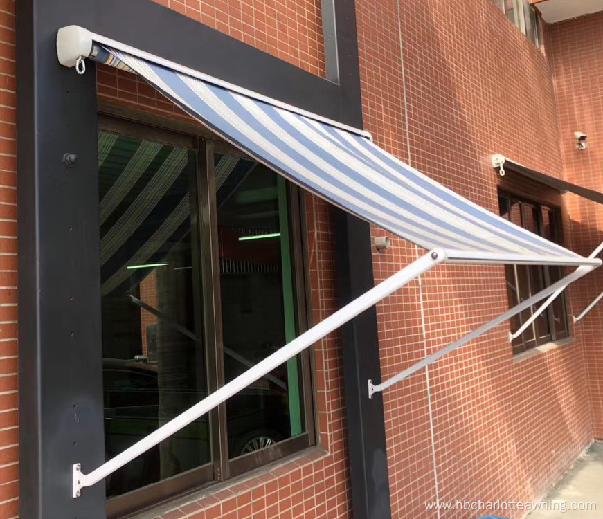 Outdoor retractable window drop arm awning