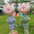 Wiggle and giggle pig toy without candy