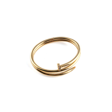 Bright shinny stainless steel gold decorated nail bangles with zirconias imbeded