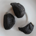 Biologisch voedsel van gepelde zwarte knoflook